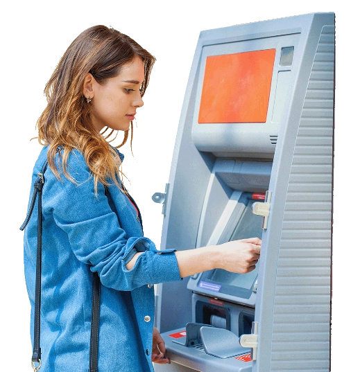 A woman using an ATM