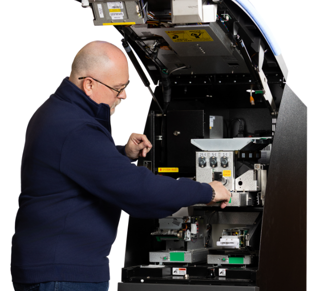 Engineer repairing an ATM