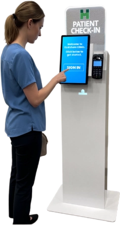 Healthcare professional operating a hospital kiosk