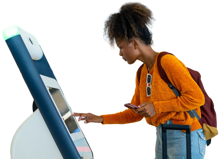 A lady at a ticket machine