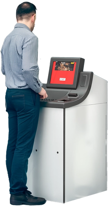 Man at a Coinmax machine
