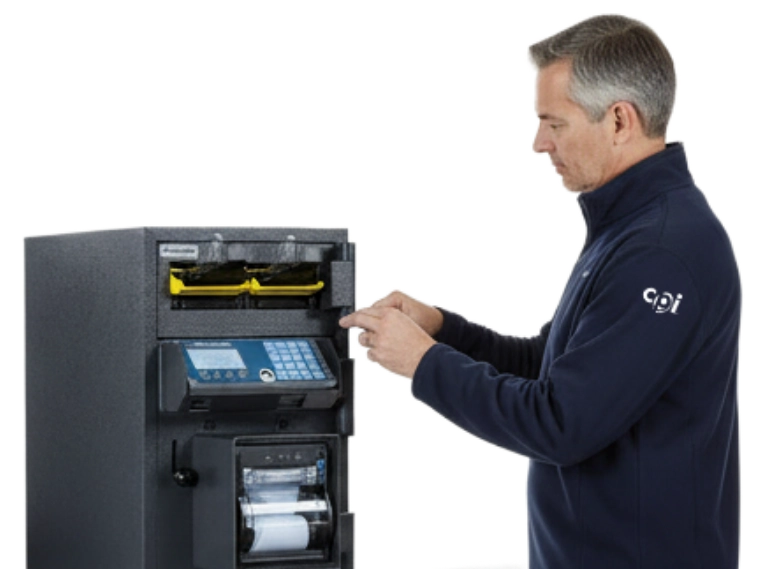 Engineer repairing a smart safe