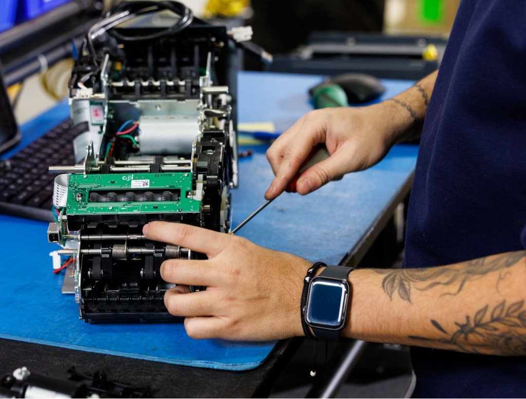 Engineer repairing a component
