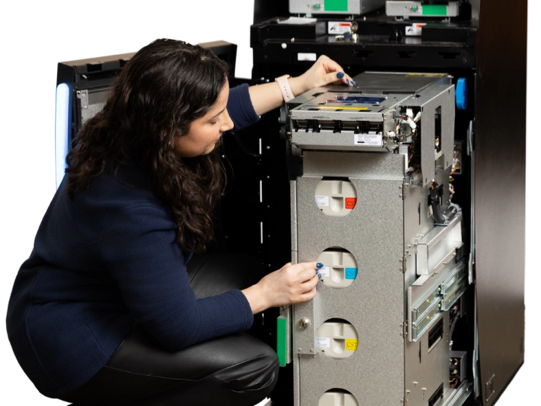Engineer repairing a Teller Cash Recycler
